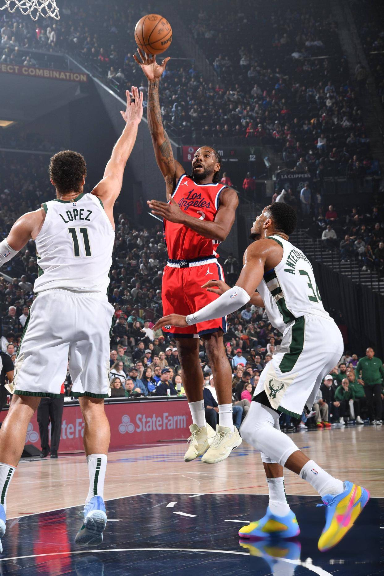 九游娱乐网页-快船血洗雄鹿B队，卡鲁索关键制胜